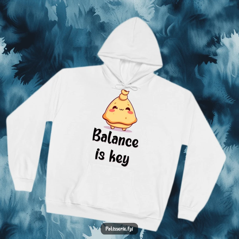 Funny samosa hoodie, mischievous expression, balancing a tiny chickpea on its nose, warm and humorous apparel, great gift.