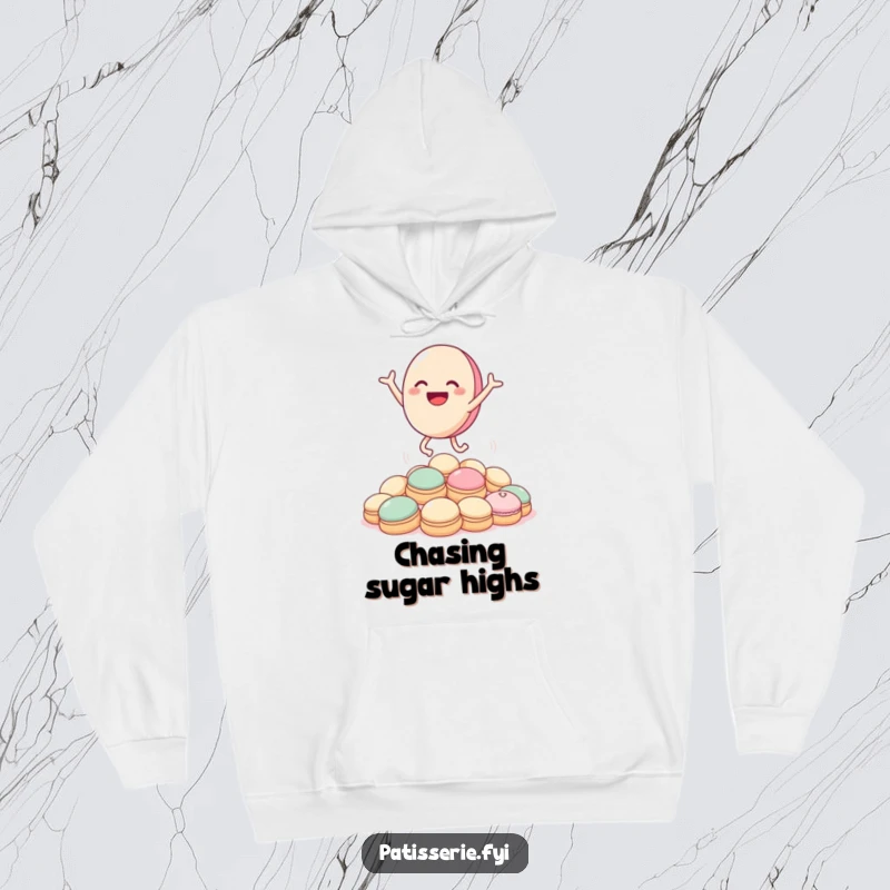 Funny macaron hoodie showing a happy macaron character enthusiastically jumping high above a stack of cream puffs.